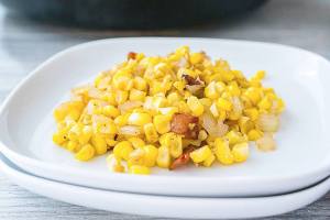Fresh corn pairs nicely with bacon on the skillet