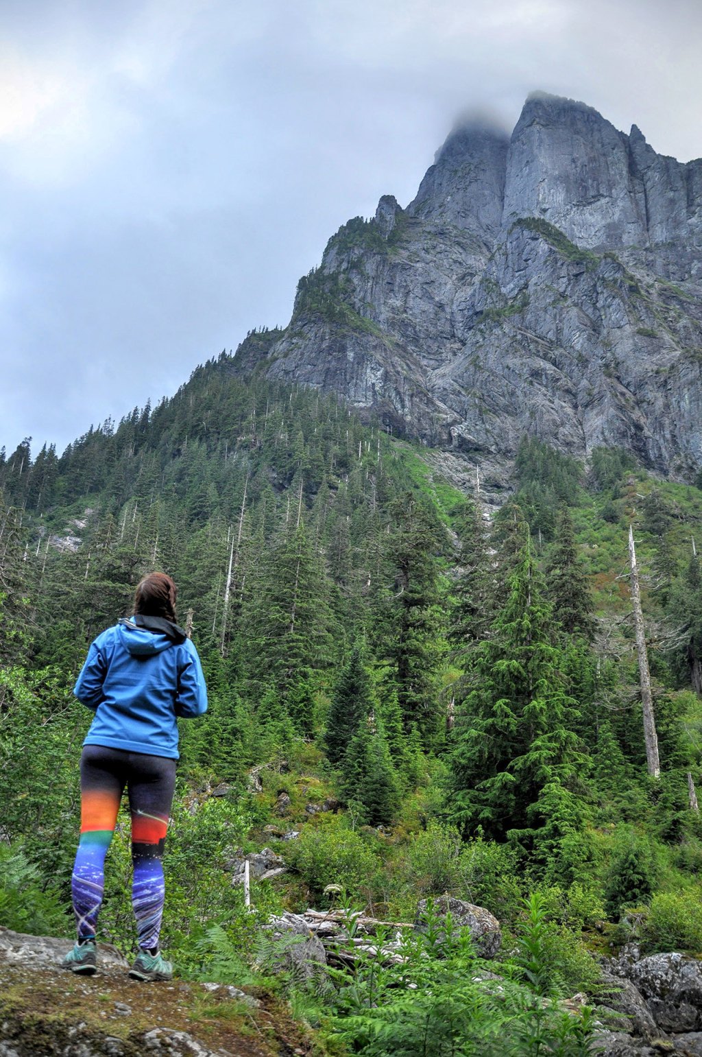 Rachel Wood looks at Baring Mountain, which rises high above Barclay Lake. (Brandon Fralic / For The Herald)