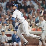 Mariners outfielder Ken Griffey Jr. watches the flight of a ball during the All-Star game on July 10, 1999, at Wrigley Field in Chicago. (AP Photo/File)