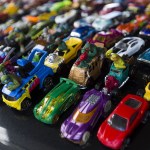 Toy Hot Wheels cars sit glued in rows to the front of Dave Heykamp&rsquo;s GMC Envoy on Wednesday, July 20, 2016. (Ian Terry / The Herald)