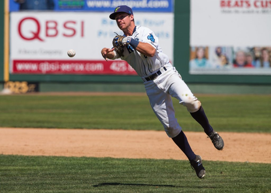 AquaSox Donnie Walton makes a leaping throw to first base as the Everett AquaSox beat the Vancouver Canadians 6-5 in the bottom of the ninth inning at Everett Memorial Stadium on Wednesday, July 27, 2016 in Everett, Wa. ( Andy Bronson / The Herald )