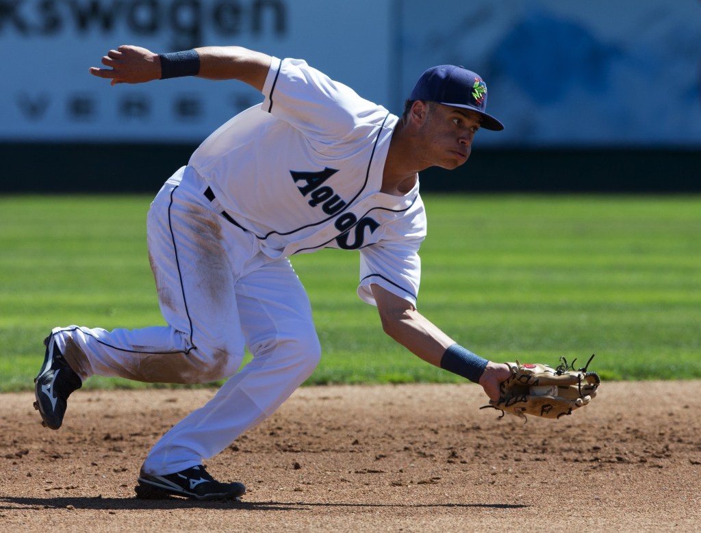 AquaSox Bryson Brigman scoops up a bouncing ball and makes the throw to first base as the Everett AquaSox beat the Vancouver Canadians 6-5 in the bottom of the ninth inning at Everett Memorial Stadium on Wednesday, July 27, 2016 in Everett, Wa. ( Andy Bronson / The Herald )