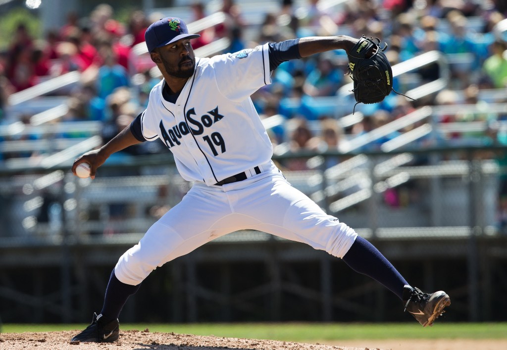 AquaSox Reggie McClain winds up for a pitch as the Everett AquaSox beat the Vancouver Canadians 6-5 in the bottom of the ninth inning at Everett Memorial Stadium on Wednesday, July 27, 2016 in Everett, Wa. ( Andy Bronson / The Herald )