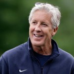 Seattle Seahawks head coach Pete Carroll smiles at an NFL football practice Thursday in Renton. (AP Photo/Elaine Thompson)