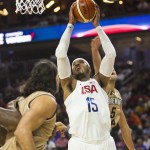 United States forward Carmelo Anthony (15) looks to shoot as Argentina forward Luis Scola (left) defends during Team USA&rsquo;s 111-74 win in an exhibition game Friday in Las Vegas. (AP Photo/L.E. Baskow)