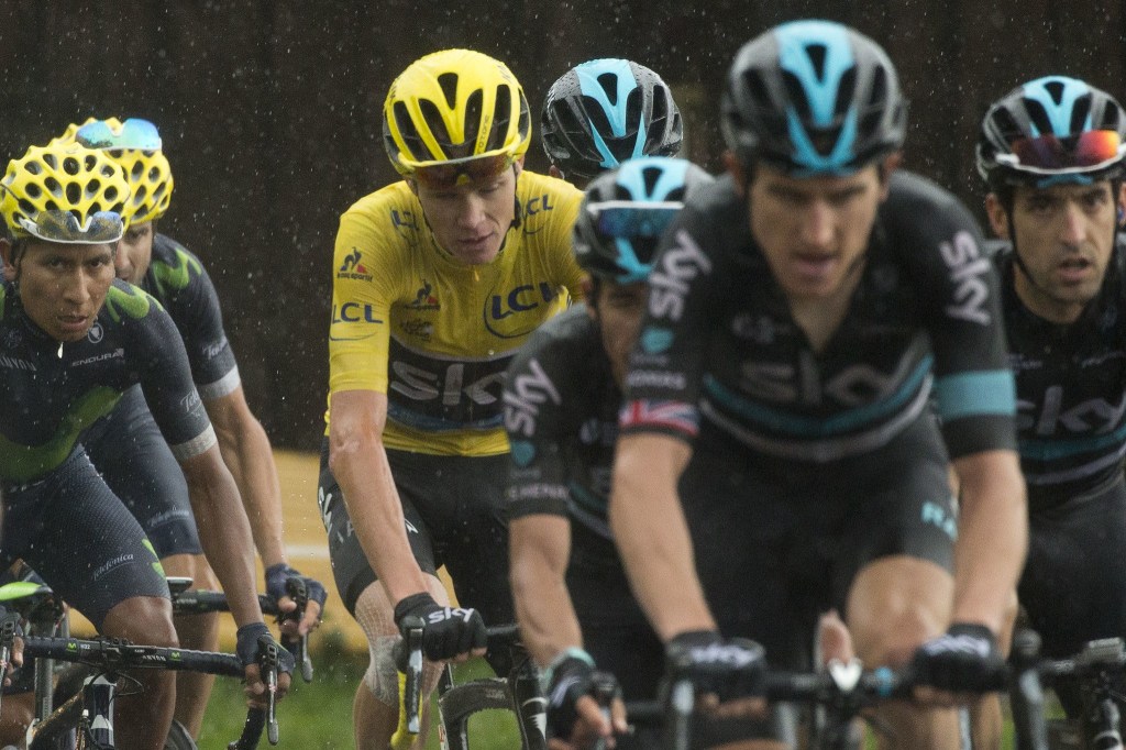 Britain&rsquo;s Chris Froome, wearing the overall leader&rsquo;s yellow jersey, and Colombia&rsquo;s Nairo Quintana (left), climb during the penultimate stage of the Tour de France on Saturday. (AP Photo/Peter Dejong)