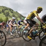 Britain&rsquo;s Chris Froome, wearing the overall leader&rsquo;s yellow jersey, rides during the penultimate stage of the Tour de France on Saturday. Froome is poised to win his third overall championship. (AP Photo/Peter Dejong)