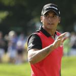 Jason Day waves to the crowd after a putt on the 10th hole during the second round of the PGA Championship at Baltusrol Golf Club in Springfield, N.J. on Friday. (AP Photo/Seth Wenig)