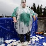 Tina Fish appears to gesture, &ldquo;No more pies!&rdquo; or perhaps, &ldquo;No photos!&rdquo; but the Girl Scout leader remains a very good sport right down to the clean-up.