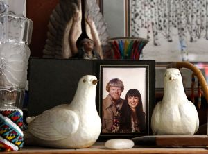 A picture of Teresa &ldquo;Flying Eagle&rdquo; Baird and her late husband, Bill, taken when they were younger, sits between doves on a shelf in Teresa&rsquo;s home.
