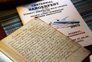 Alf Knudsen takes a look at some historic materials from Jerry Hilson, some dating back to 1902, including records made at meetings held when the chorus first began.