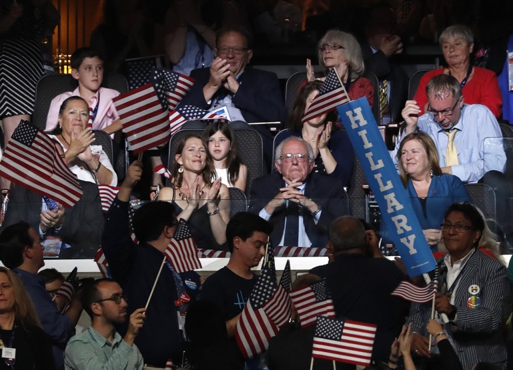 Former Democratic presidential candidate Sen. Bernie Sanders and family attend Democratic presidential nominee Hillary Clinton&rsquo;s acceptance speech during the final day of the Democratic National Convention in Philadelphia on Thursday. (AP Photo/Paul Sancya)