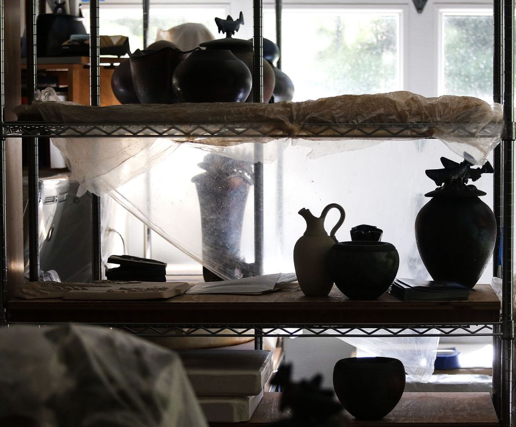Morning sunlight finds the windows in Marguerite Goff&rsquo;s studio, silhouetting a variety of ceramics in various stages of development.