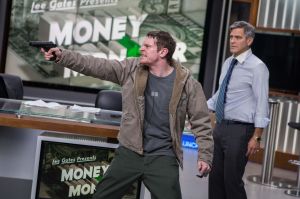 Jack O&rsquo;Connell, left, is working-class stockholder Kyle Budwell, who is mad as hell and not going to take it anymore. Atsushi Nishijima/TriStar Pictures- Sony Pictures via AP