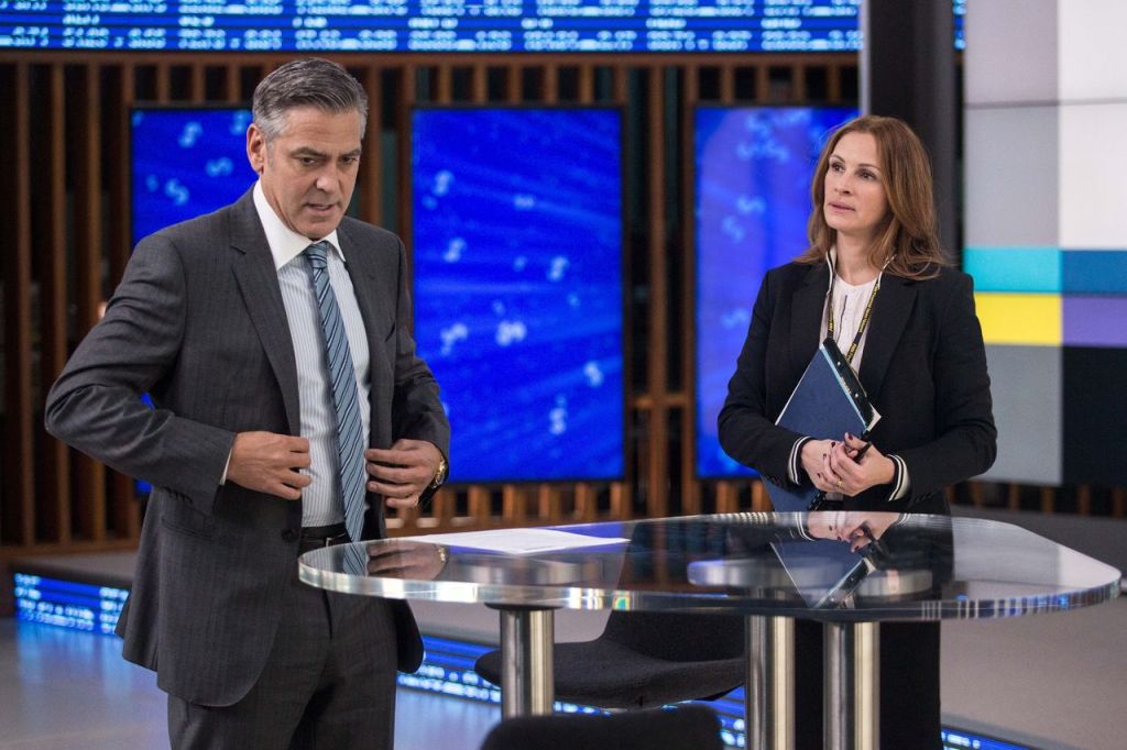 In this image released by Sony Pictures, George Clooney, left, and Julia Roberts appear in a scene from "Money Monster." (Atsushi Nishijima/TriStar Pictures- Sony Pictures via AP)
