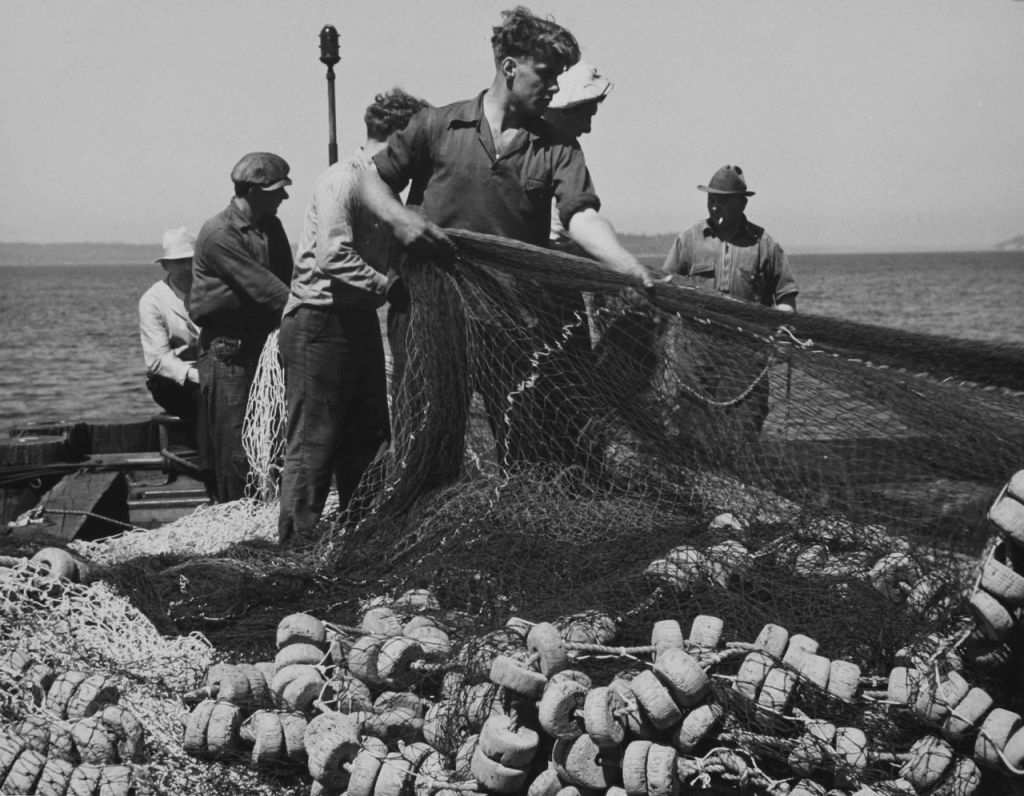 The "Northwest Photography at Mid-Century" exhibit at Cascadia Art Museum includes this photograph of local fishermen and their nets by Everett native Marjorie Duryee.
