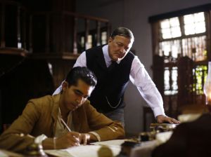 Dev Patel (left) dazzles Stephen Fry with his math genius in &ldquo;The Man Who Invented Infinity.&rdquo;