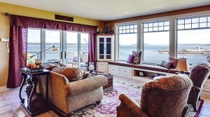the family room offers 180-degree views of the Puget sound with access to an expansive second-level deck.