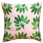 Blush Label&rsquo; Little Palms Indoor/Outdoor Pillow pairs palm branches with the also-trendy pale pink (shopcandelabra.com).