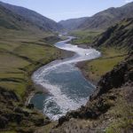 Jet boats run the river into Hells Canyon as seen from Snake River Trail 102 near Suicide Point.