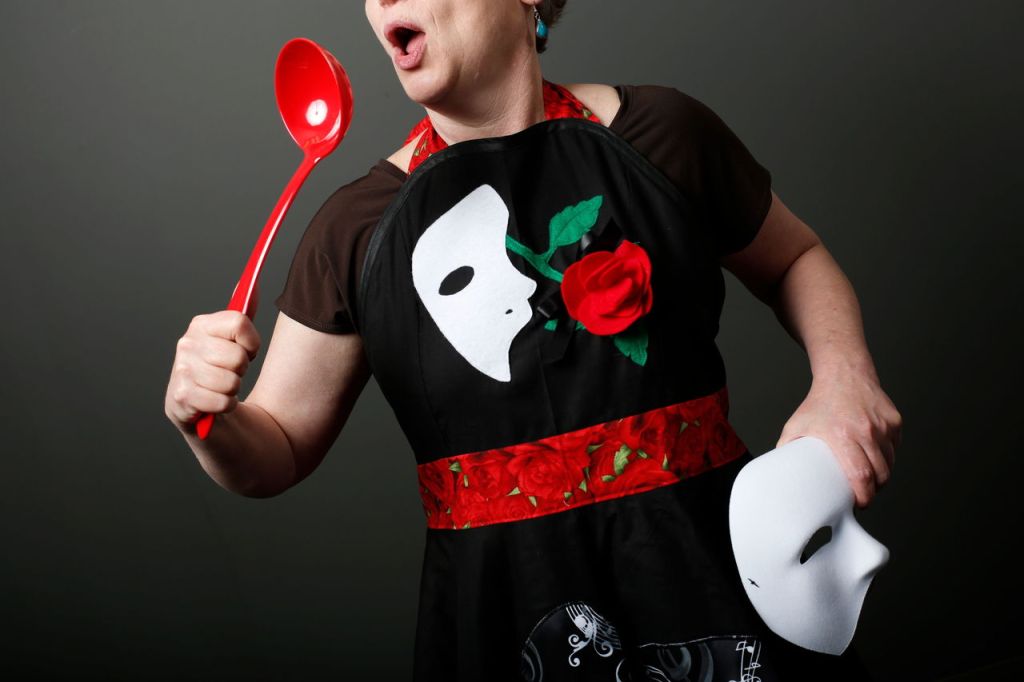 The double-skirted, Phantom of the Opera-themed apron by Oregon seamstress Amber Burns, who sells them on etsy.com under the trade name BellaLise Designs. Accessories provided by BobaKhan and Party@Display & Costume. The aprons sell for $80 at BobaKhan in Everett.