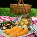 A stylish portable lunch is a breeze with black bean summer salad, marinated melon and a chicken taco built in a snack-size bag of tortilla chips.