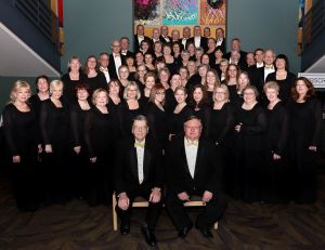 The Everett Chorale, directed by Lee Mathews, front left, and accompanied by D. Kim Croft, front right, will perform the finale of the chorale&rsquo;s 50th year in concerts Saturday evening and Sunday afternoon at the Everett Performing Arts Center.