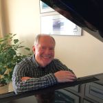 Ken Kraintz at his grand piano.