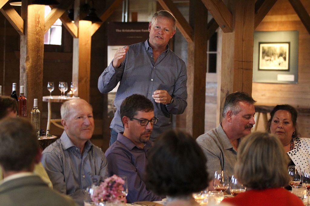 Kris Kristoferson speaks to guests at a farm dinner at Kristoferson Farms on Camano Island on June 11.