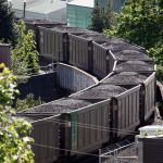 A coal train passes through Everett.