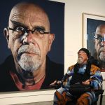 Shortly after arriving at the Schack, artist Chuck Close tours the main floor.