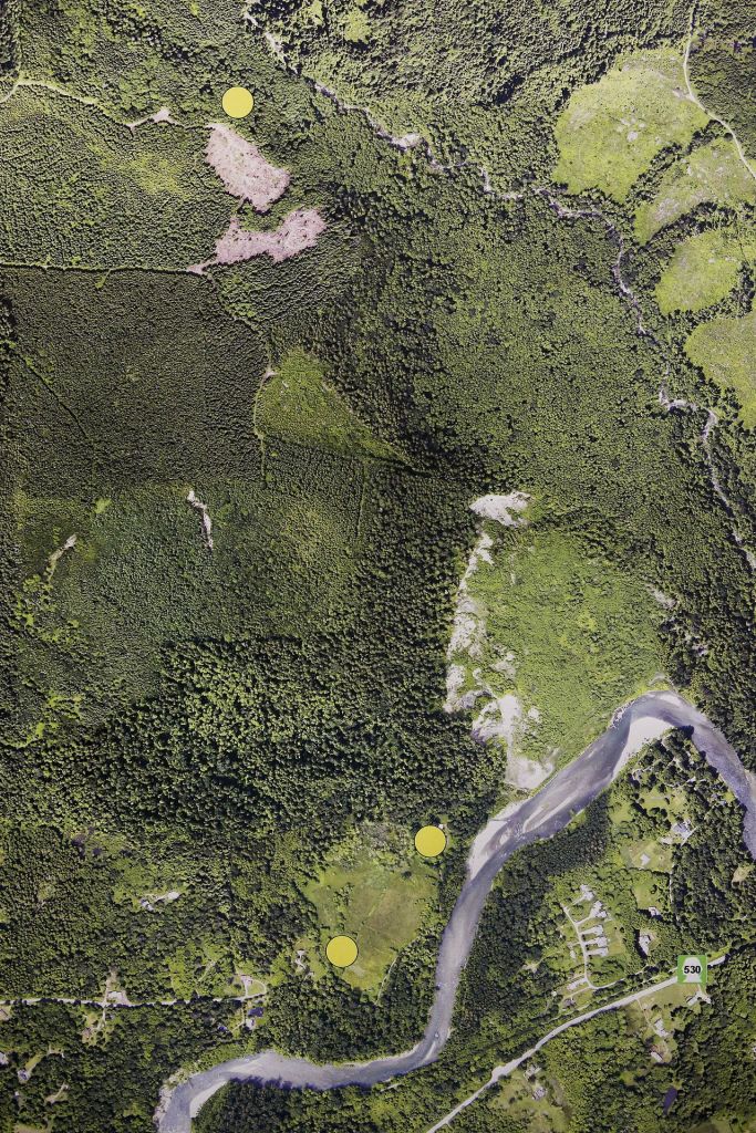 A map of the Oso area shows where a male and female body were discovered (yellow dot at top) during a search Tuesday. The yellow dots at bottom are where the missing couple&rsquo;s vehicles were found.