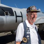 B-17 bomber veteran Arthur Unruh stands in front of his waist gunner position next to the Experimental Aircraft Association&rsquo;s Aluminum Overcast bomber Monday at Boeing Field in Seattle. Unruh and 12 other vets, who fought WWII in B-17s, met at the Museum of Flight for a D-Day reunion.
