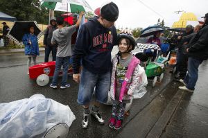 Forrest Warner (center) gives his granddaughter Peyton Calkins, 7, some advice as they prepared for her first run at the Stanwood Camano Island Soap Box Derby on Saturday in Stanwood.