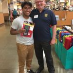 Rotary Club of Everett awarded 12 graduating seniors in the Everett School District with $500 to spend June 9 at Fred Meyer as part of its annual College Essentials program. Pictured are Cascade High School student Irais Hernandez-Vasquez and Rotarian Glen Bachman. Hernandez-Vasquez has been accepted to Seattle Pacific University and is the first in his family to go to college.
