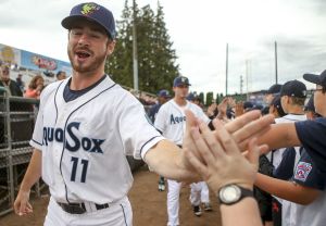 Everett&rsquo;s Matthew Festa makes his way to the dug out to start the home opener Thursday night at Memorial Stadium in Everett.