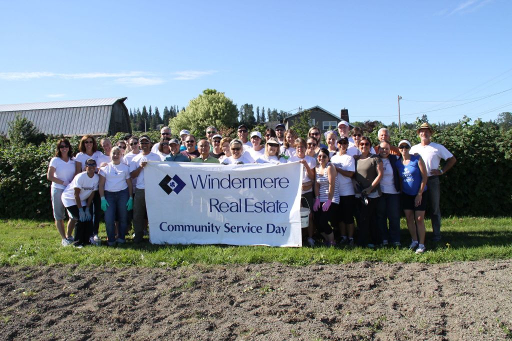 Contributed photo About 50 volunteers from the Windermere Lynnwood office performed a Day of Service June 3 at the Martha Perry Community Veggie Garden in Snohomish.