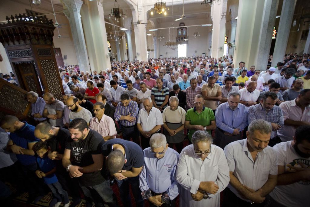 Egyptians perform prayers for the dead for victims of EgyptAir flight 804 at al Thawrah Mosque in Cairo on Friday.