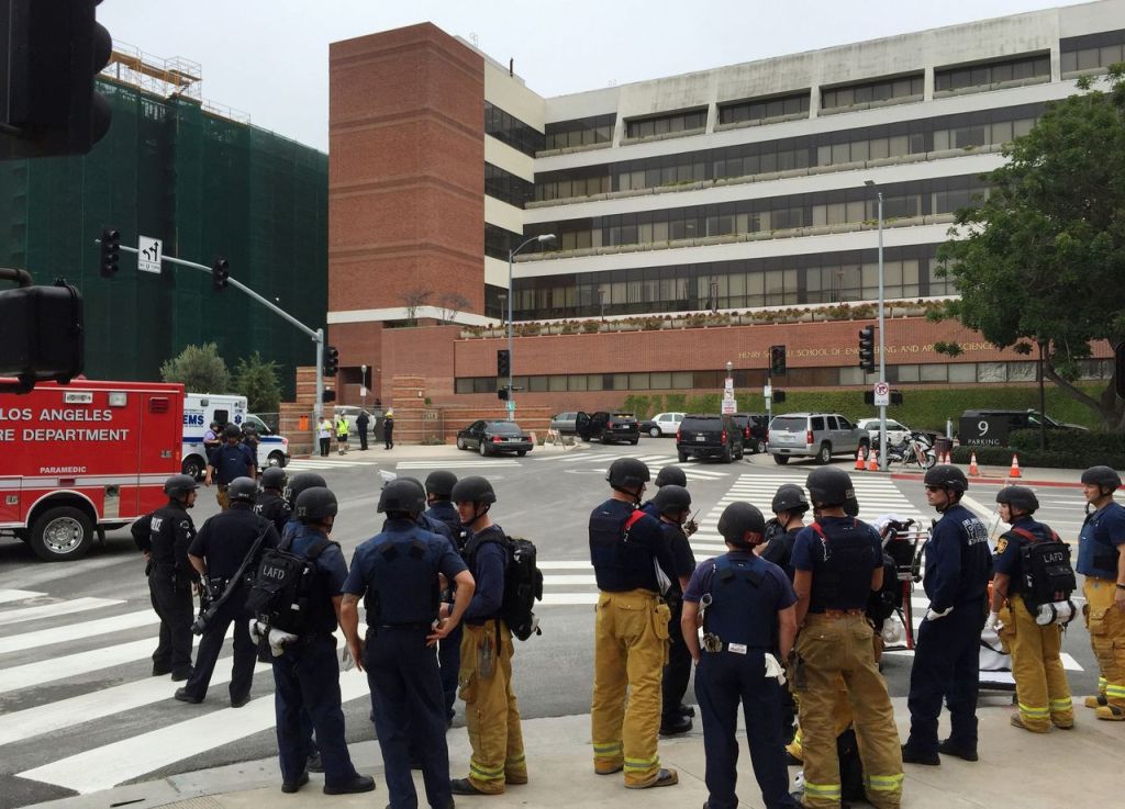 Los Angeles fire department personnel gather at the scene of a fatal shooting at the University of California, Los Angeles, on Wednesday.