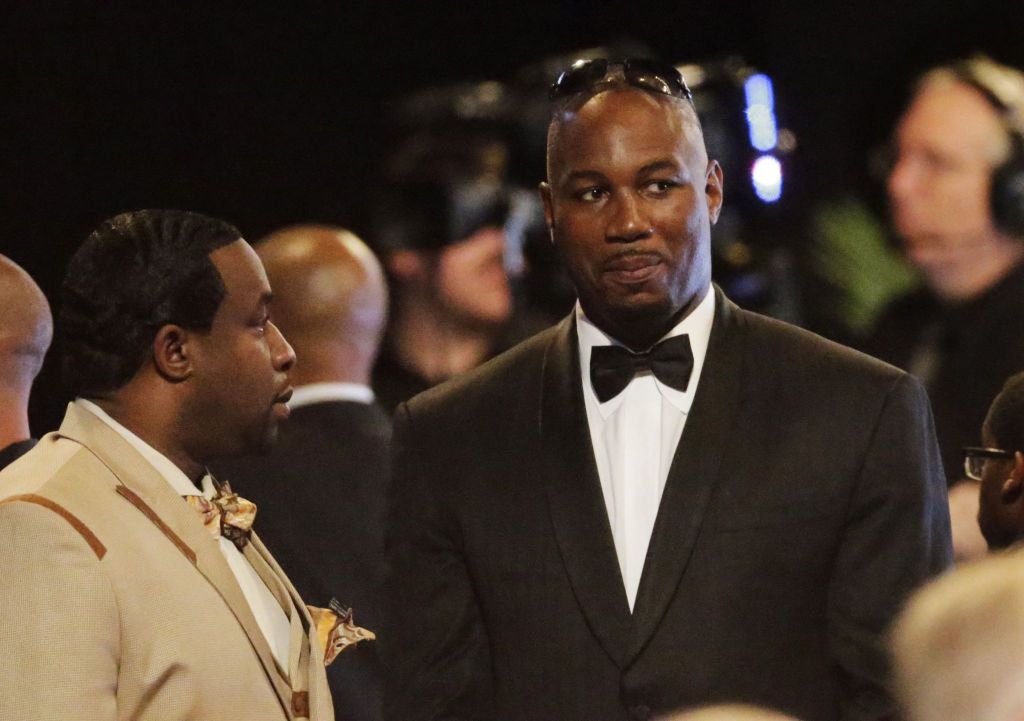 Boxer Lennox Lewis (right) arrives for Muhammad Ali&rsquo;s memorial service.