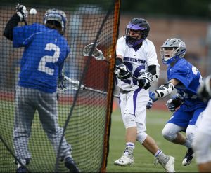 Kamiak&rsquo;s Ben Barton (center) fires a shot past Seattle Prep goalie Bennett Lingg (left) during a state tournament game Wednesday at Kamiak High School in Mukilteo.