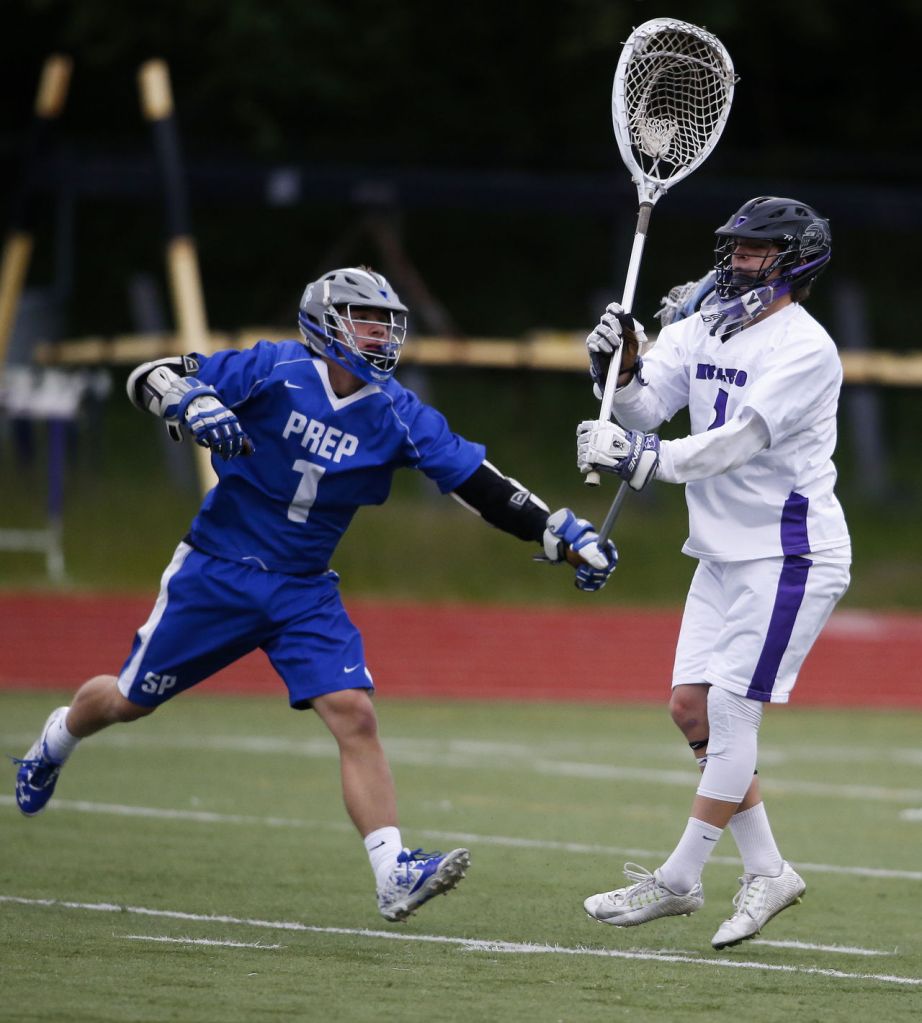 Kamiak goalie Joseph Prikhodko (right) is pressured by Seattle Prep&rsquo;s Sergie Jacobs during a state tournament game Wednesday at Kamiak High School in Mukilteo.