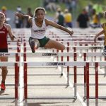 Jackson&rsquo;s Michal Jones (center) flies over the last hurdle to win the girls 100-meter hurdles at the Wesco 4A league championships on Friday at Snohomish High School.