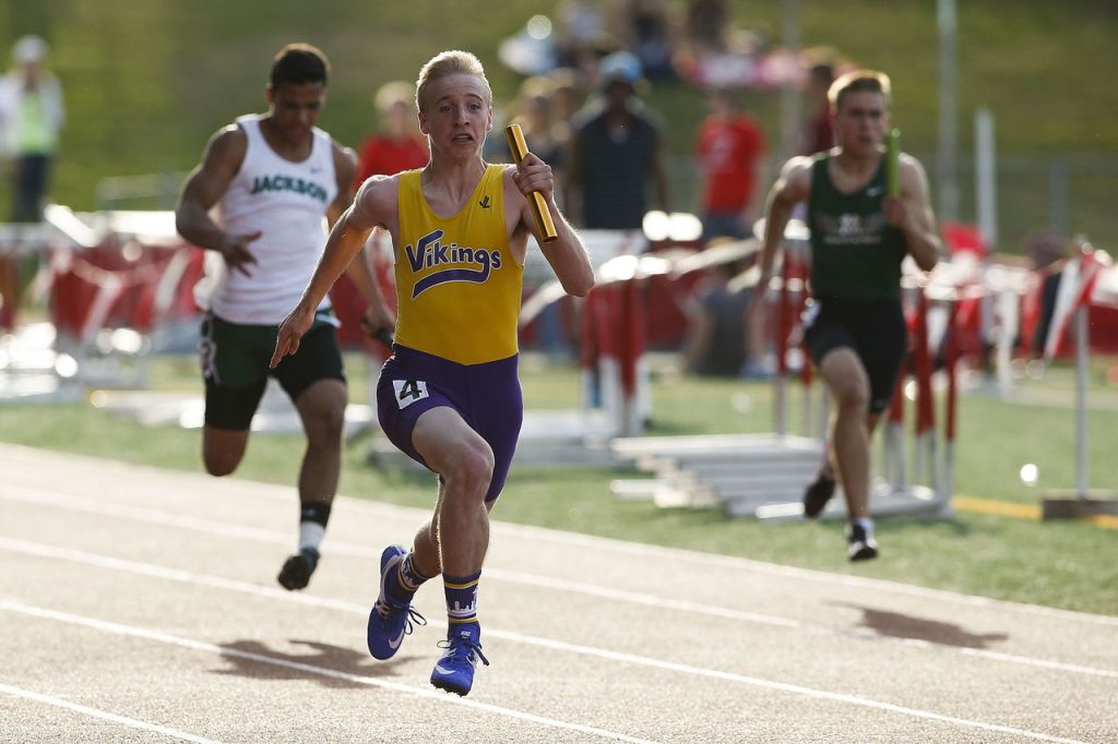 Lake Stevens&rsquo; Matthew Zehrung (center) comes down the home stretch to win the boys 4x100-meter relay at the Wesco 4A league championships on Friday at Snohomish High School.