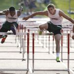 Jackson&rsquo;s Dylan Roy (right) edges out teammate Silas Vega-Harris (left) for the win in the boys 110-meter hurdles at the Wesco 4A league championships on Friday at Snohomish High School.