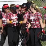 Archbishop Murphy&rsquo;s Alyson Matriotti (center) celebrates her home run with teammates in the first inning of a game Wednesday against Cedarcrest at Archbishop Murphy High School. Cedarcrest won 8-6.
