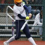 Everett&rsquo;s Gabby Koehler hits a double during the Class 3A softball third-place game against Mt. Spokane in Lacey on Saturday. Everett defeated Mt. Spokane 14-4.