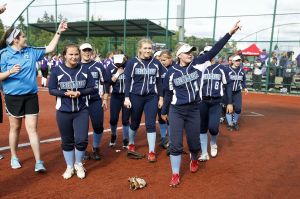 Meadowdale players walk off the field following their win over Lake Washington in the second round of the 3A state softball tourney Friday in Lacey.