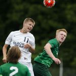 Edmonds-Woodway&rsquo;s Ethan Hopkins (right) and Glacier Peak&rsquo;s Tucker Davis go up for a header during the Wesco 3A championship game at Shoreline Stadium on May 14.