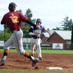 Arlington&rsquo;s Jack Sheward (23) retreats back to first base after a fly ball was caught in right field during Sunday&rsquo;s game against Lakeside of Seattle.